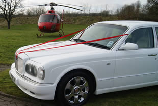 Arnage alongside helicopter at event