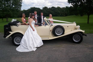 Bride stands next to Beauford