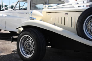 Close up view of Beauford and Austin vintage wedding cars